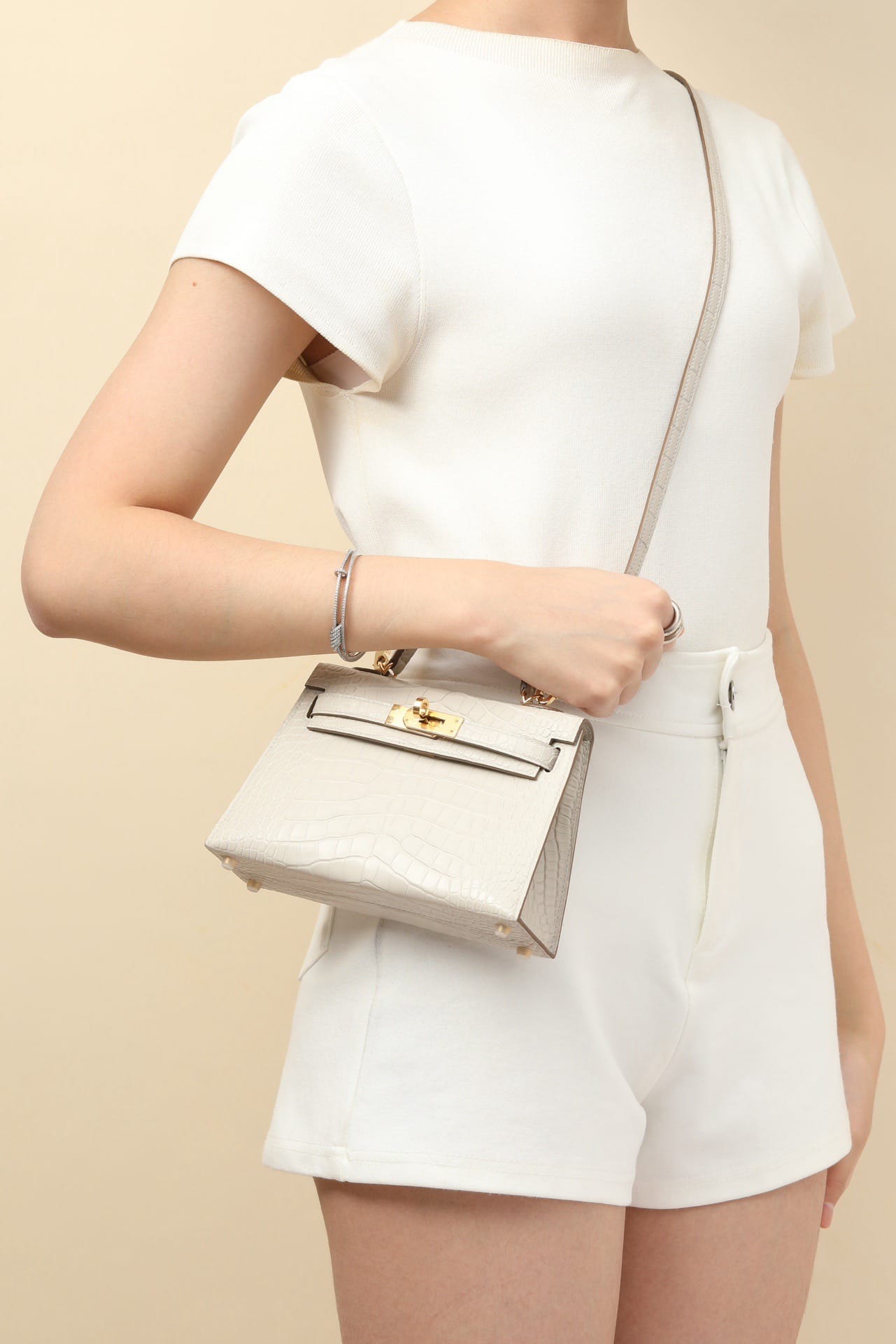 Kelly 19 Croco Hermes 8L gold