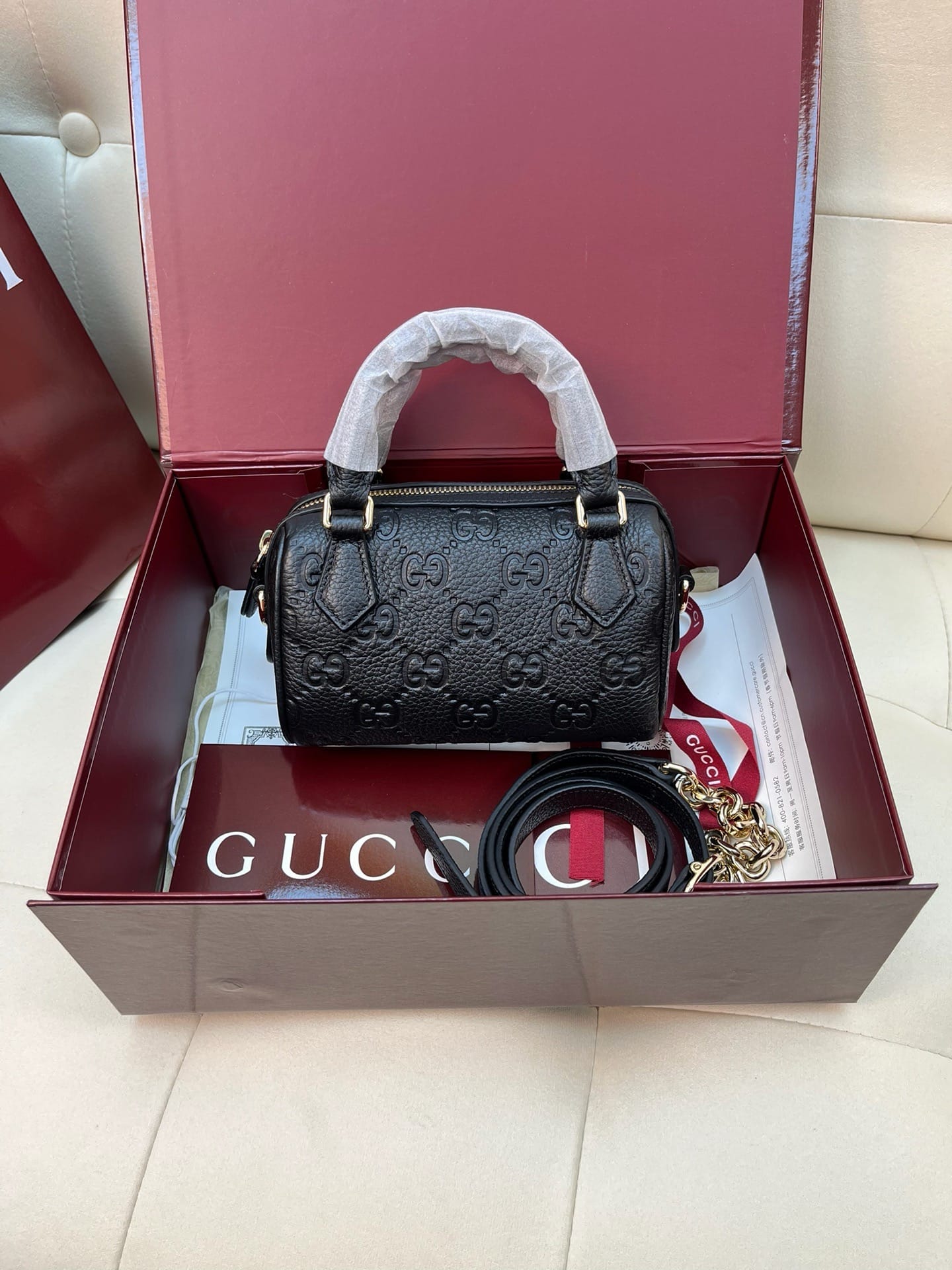 Emblem Gucci 815256